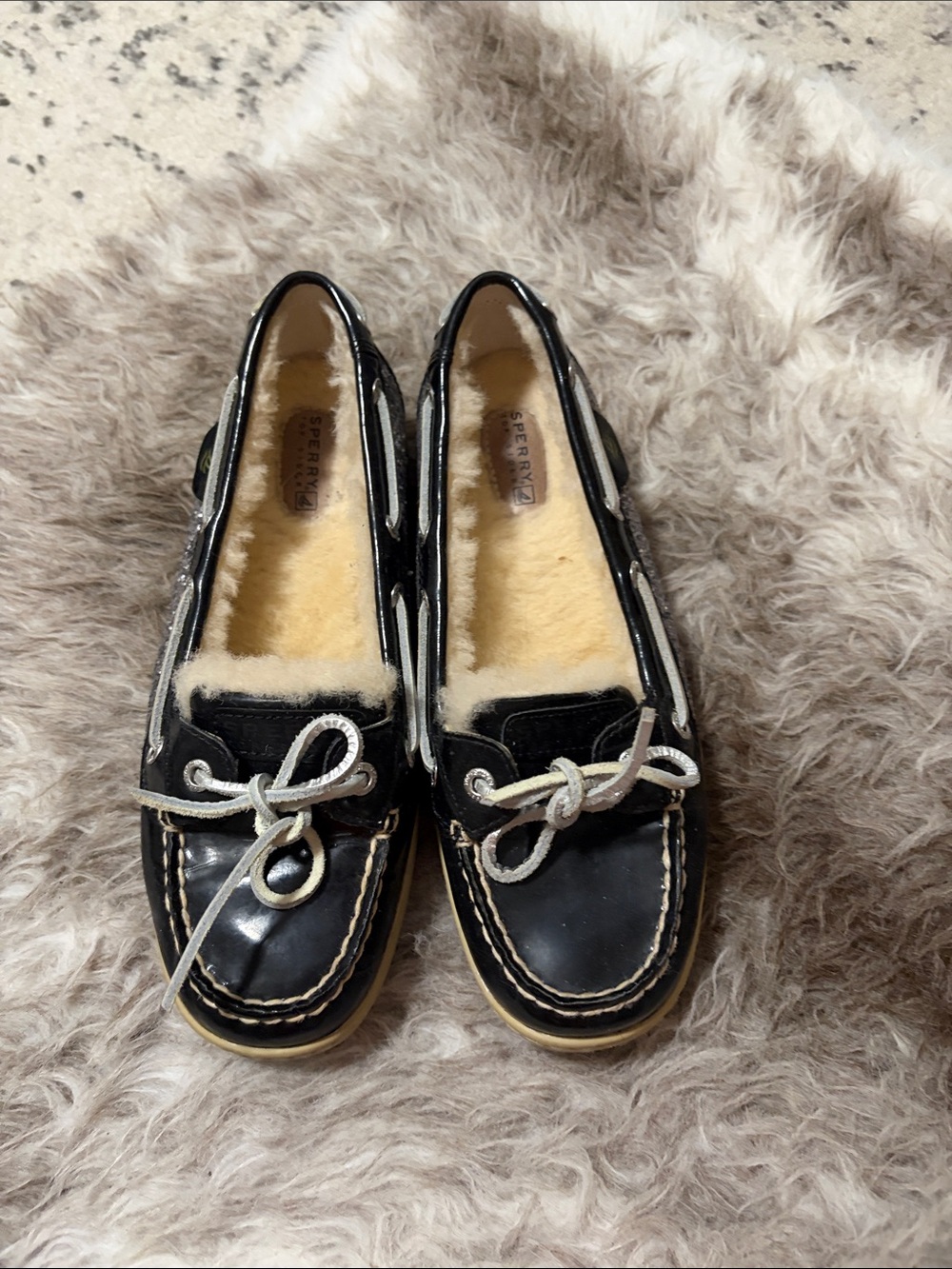 Sperry Black Leather Moccasins with Cream Fleece Lining